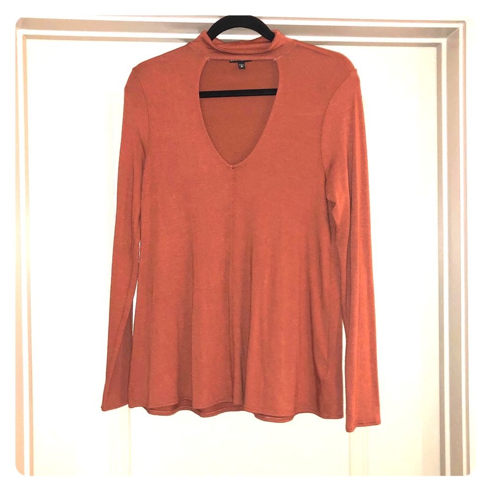 Express long sleeve, choker cut out, tunic.
